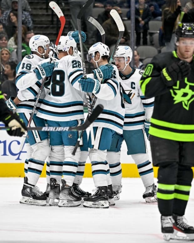 Nov 11, 2022; Dallas, Texas, USA; San Jose Sharks center Tomas Hertl (48) and right wing Timo Meier (28) and defenseman Erik Karlsson (65) and center Logan Couture (39) and left wing Alexander Barabanov (94) celebrates a goal scored by Barabanov against the Dallas Stars during the first period at American Airlines Center. Mandatory Credit: Jerome Miron-USA TODAY Sports